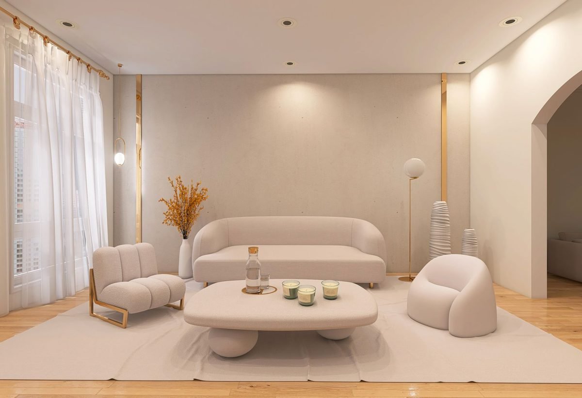 Light cream walls and soft white decor in a small living room that feels open and airy